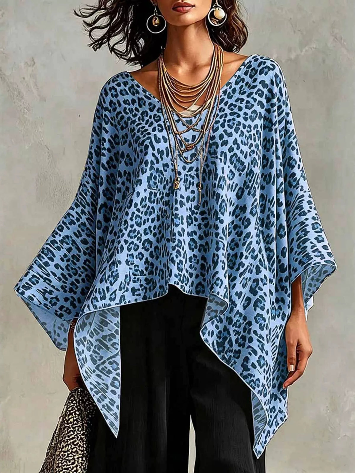 Plus size leopard print asymmetrical hem top by Plush Fashion Hub, featuring a stylish, flowing design and bold animal print.