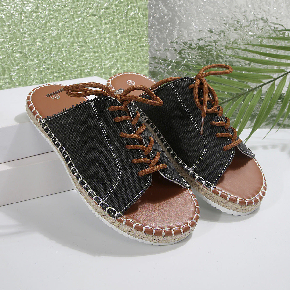 Women’s faux leather lace-up open toe flat sandals by Plush Fashion Hub, featuring open toe design and casual slip-on style.