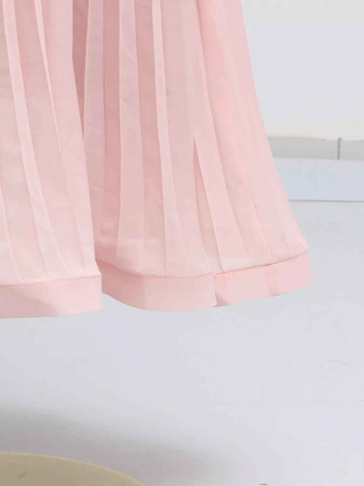 Plush Fashion Hub frill lapel collar top and pleated skirt set, stylish two-piece outfit for women, in a coordinated look.