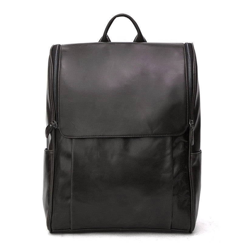 Black leather computer backpack by Pi-Mart, first layer leather bag with multiple compartments and adjustable straps.
