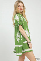 Women's two-tone border print flowy mini dress by Trendsi, featuring a casual summer boho style with lightweight fabric.