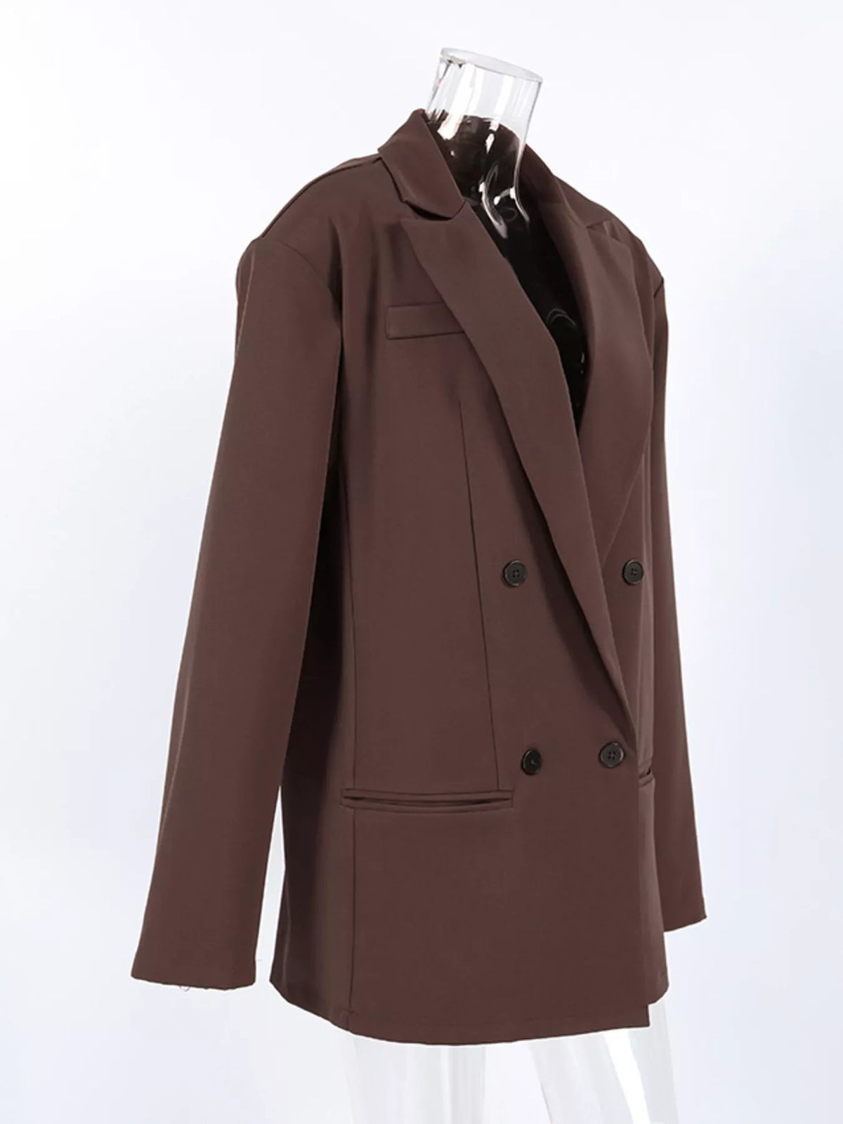 Black double-breasted blazer with lapel collar, tailored fit, and button details, from Trendsi.