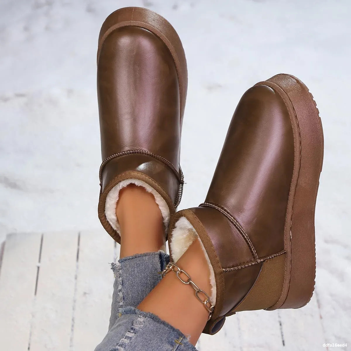 Faux-fur platform ankle boots from Trendsi, featuring a stylish design with chunky heels and cozy fur trim for cold weather.