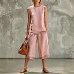 Women's tank top and wide-leg pants set by Plush Fashion Hub featuring side splits, pockets, and button details.
