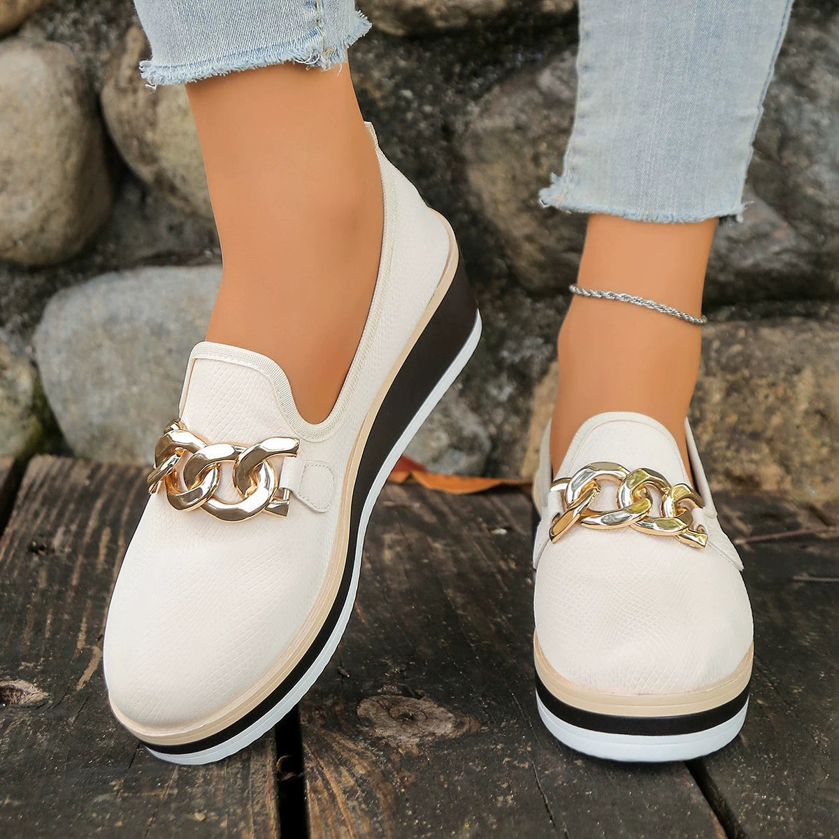Chain decor wedge loafers from Trendsi, stylish footwear with a sleek design, featuring a chain detail on the wedge heel.