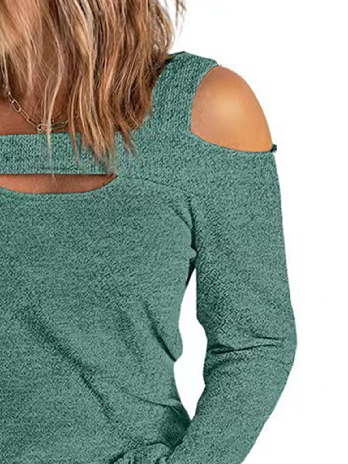 Elegant women's cold shoulder blouse made of polyester with cutout details, from Plush Fashion Hub, styled with long sleeves.