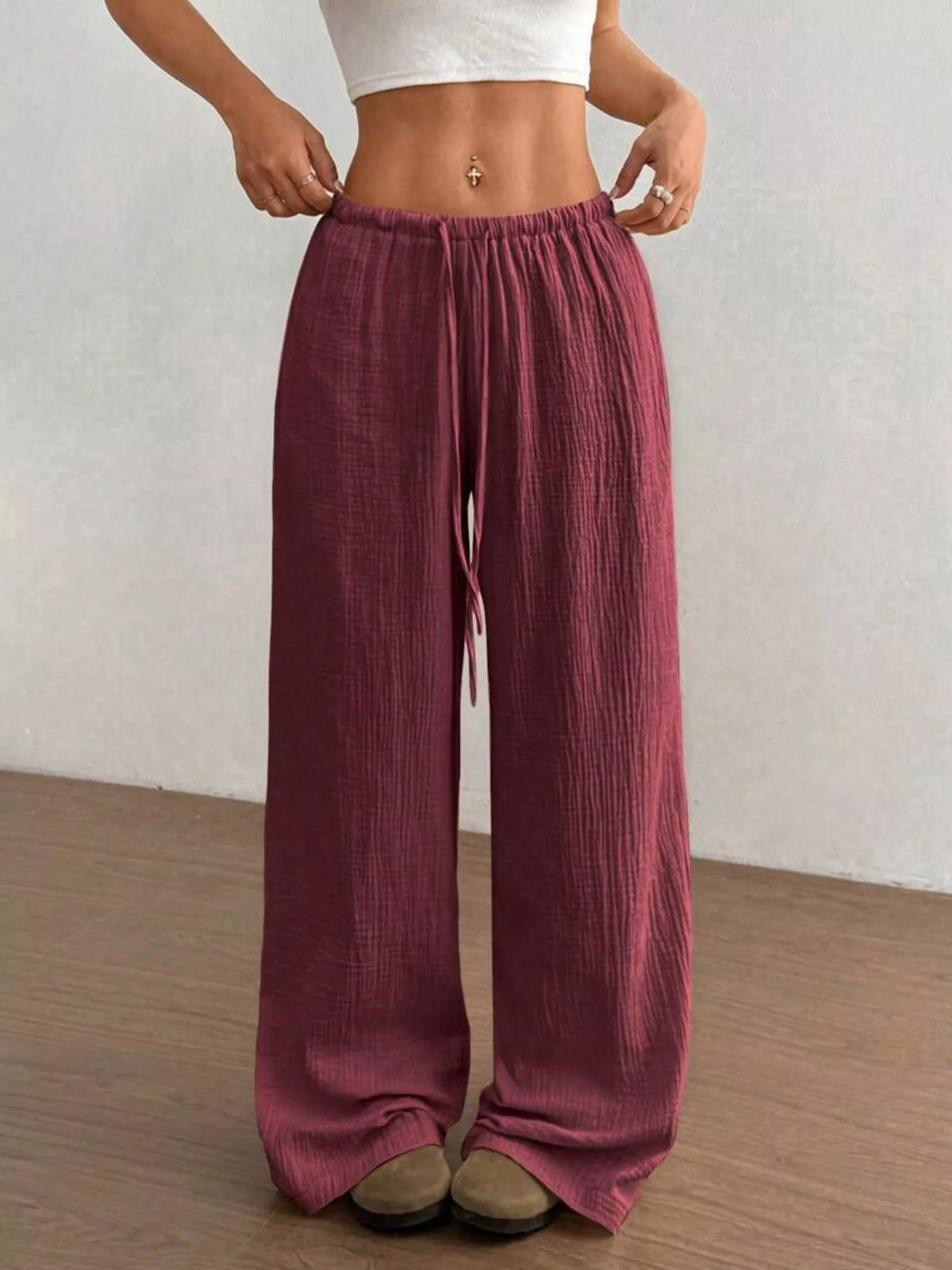 Plush Fashion Hub wide-leg drawstring pants in soft plush fabric, showcasing a relaxed fit and comfortable style.