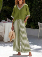 Women's striped tunic top and casual trousers two-piece set by FitiqueFit, featuring a relaxed fit and stylish design.
