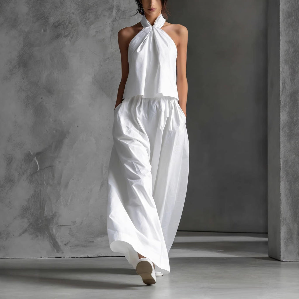 Women's loose sleeveless top and high-waist wide-leg pants set by FitiqueFit in four colors, casualwear style, front view.