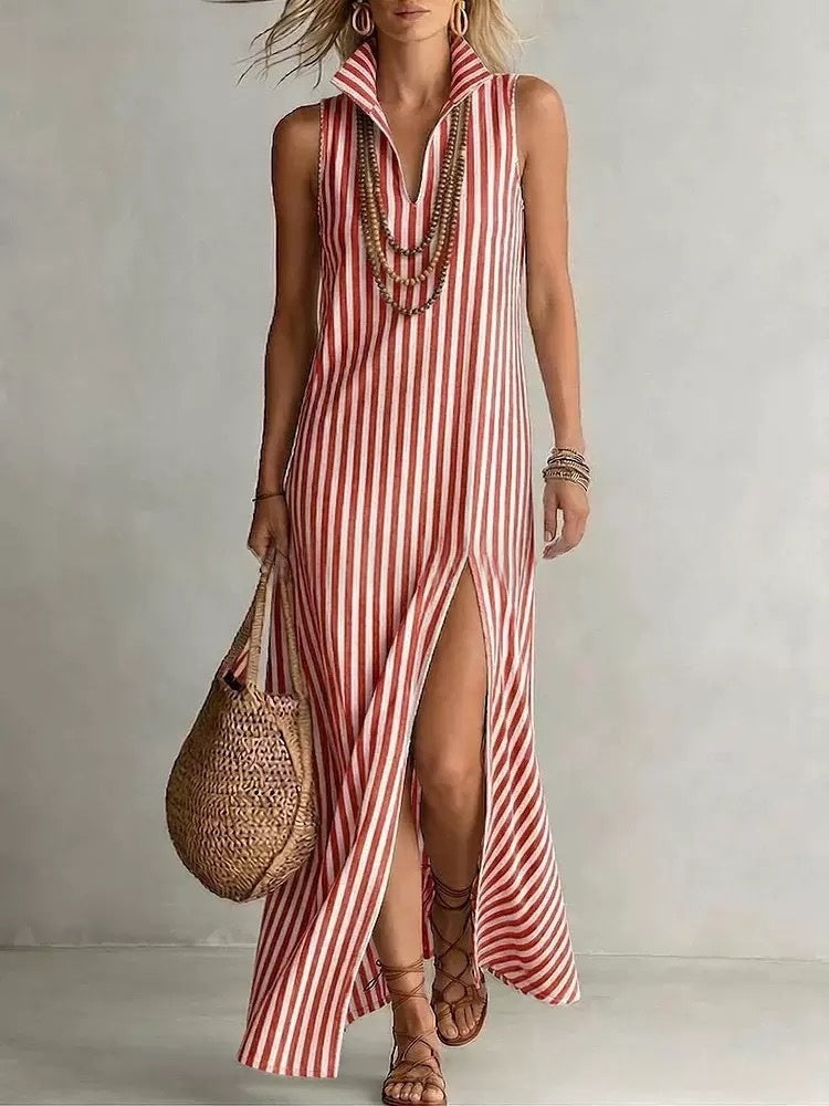 Striped sleeveless maxi dress with side slit and stand collar, casual A-line cami dress by FitiqueFit, shown hanging on a water background.