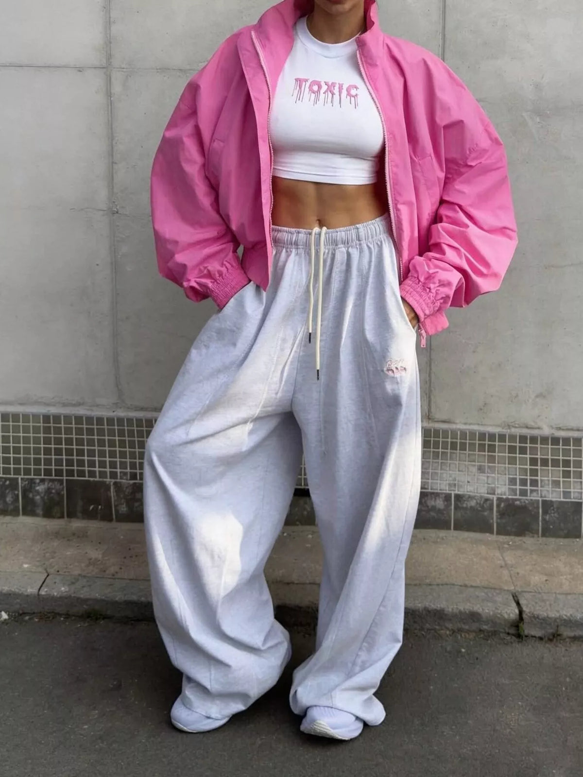Women's oversized zip-up bomber jacket by Trendsi, featuring a stylish design with a front zipper and relaxed fit.