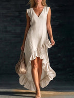 Women's sleeveless V-neck ruffle hem maxi dress in cotton linen, casualwear by FitiqueFit, shown in a relaxed fit style.