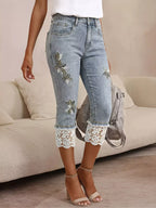 Lace trimmed Capri jeans by Shopimist featuring classic denim fabric, cropped length, and decorative lace detail along the hem.