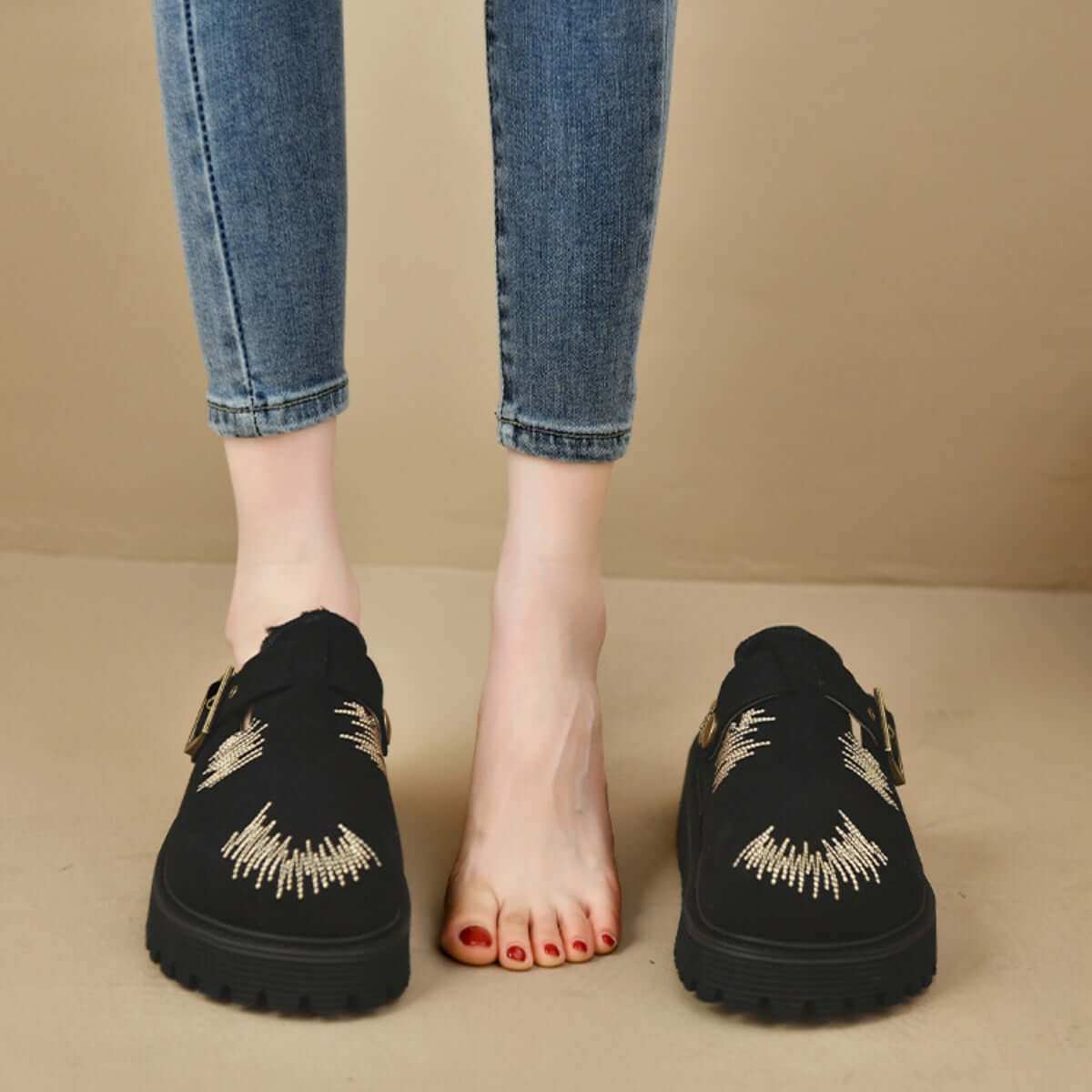 Round Toe Platform Loafers in black suede with decorative details, worn with jeans.