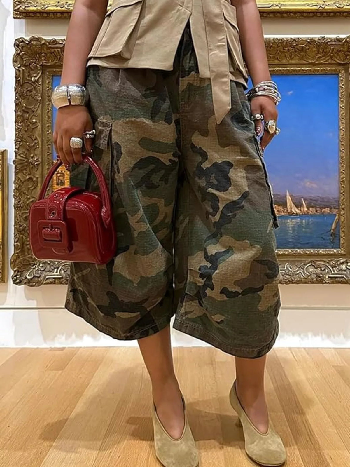 Camouflage cargo cropped pants by Plush Fashion Hub featuring multiple pockets and a relaxed fit.