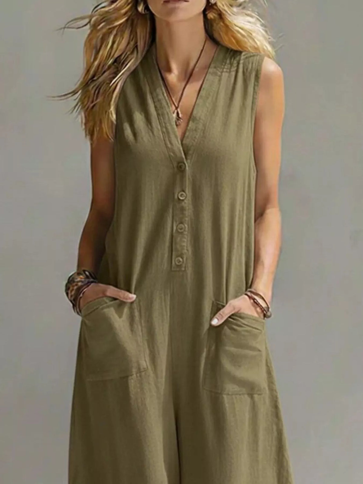 Plus size sleeveless V-neck jumpsuit with wide-leg pants from Plush Fashion Hub, shown in a full-size, stylish and comfortable fit.