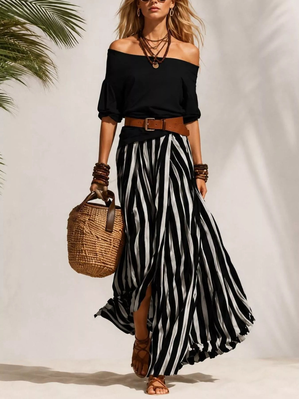 Off shoulder top and striped maxi skirt set by Plush Fashion Hub, featuring a stylish matching outfit with a relaxed fit.