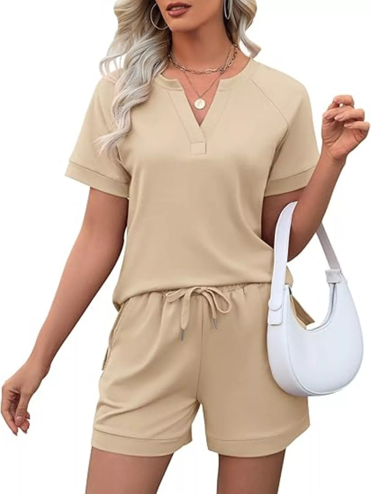 Solid color short sleeve top and shorts two-piece set from Plush Fashion Hub, casual summer apparel for women.