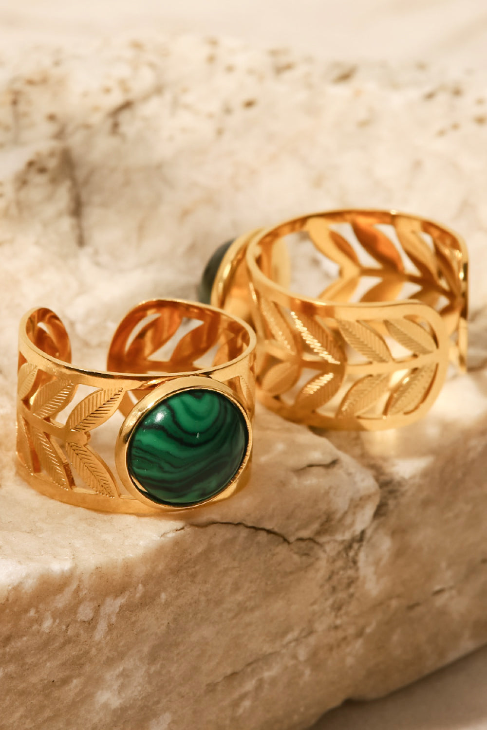 18k gold plated malachite leaf ring featuring a detailed green malachite gemstone and intricate leaf design.