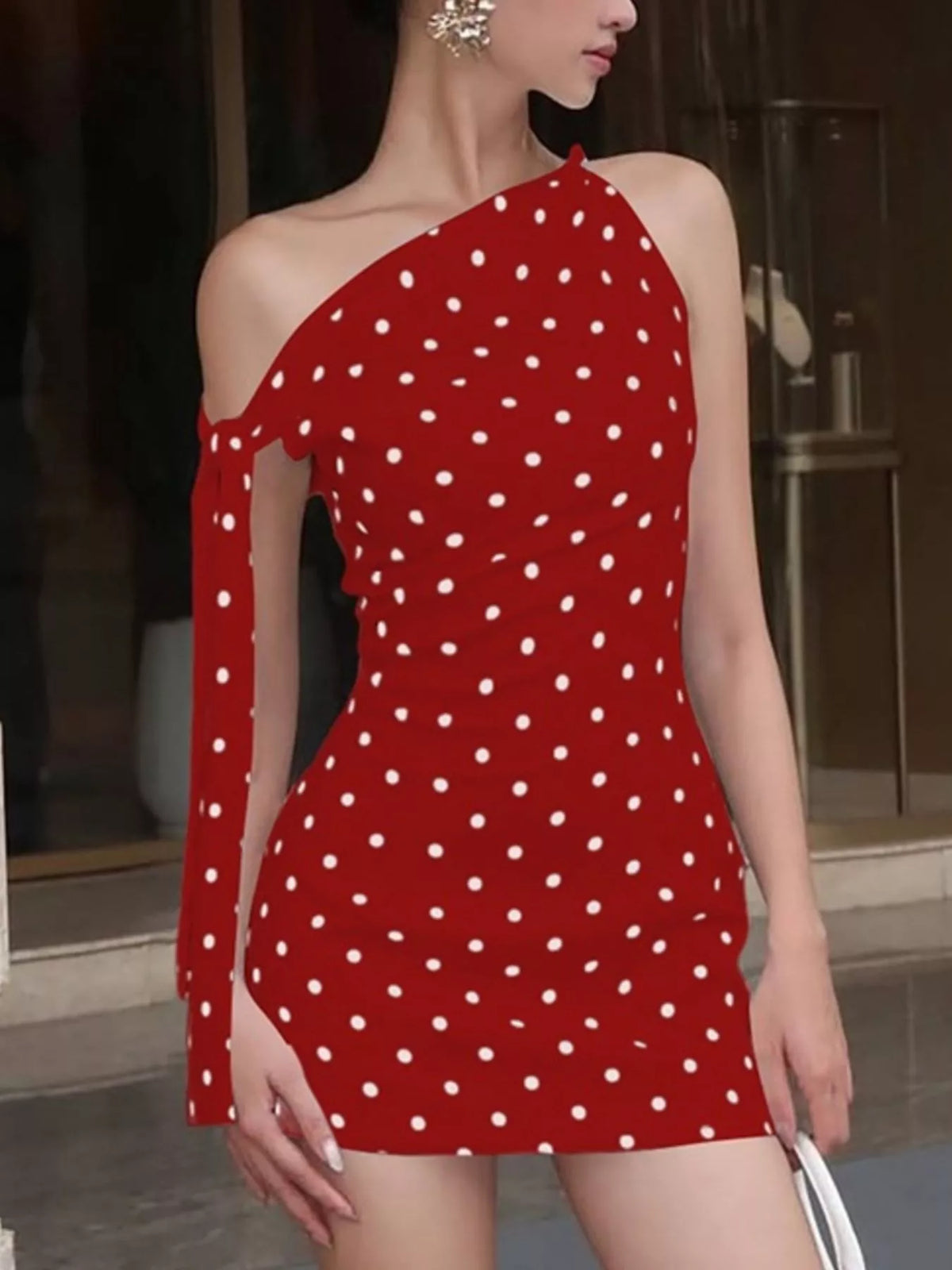 Polka dot sleeveless mini dress with bow accents, stylish dress from Plush Fashion Hub, featuring a fitted bodice and playful design.