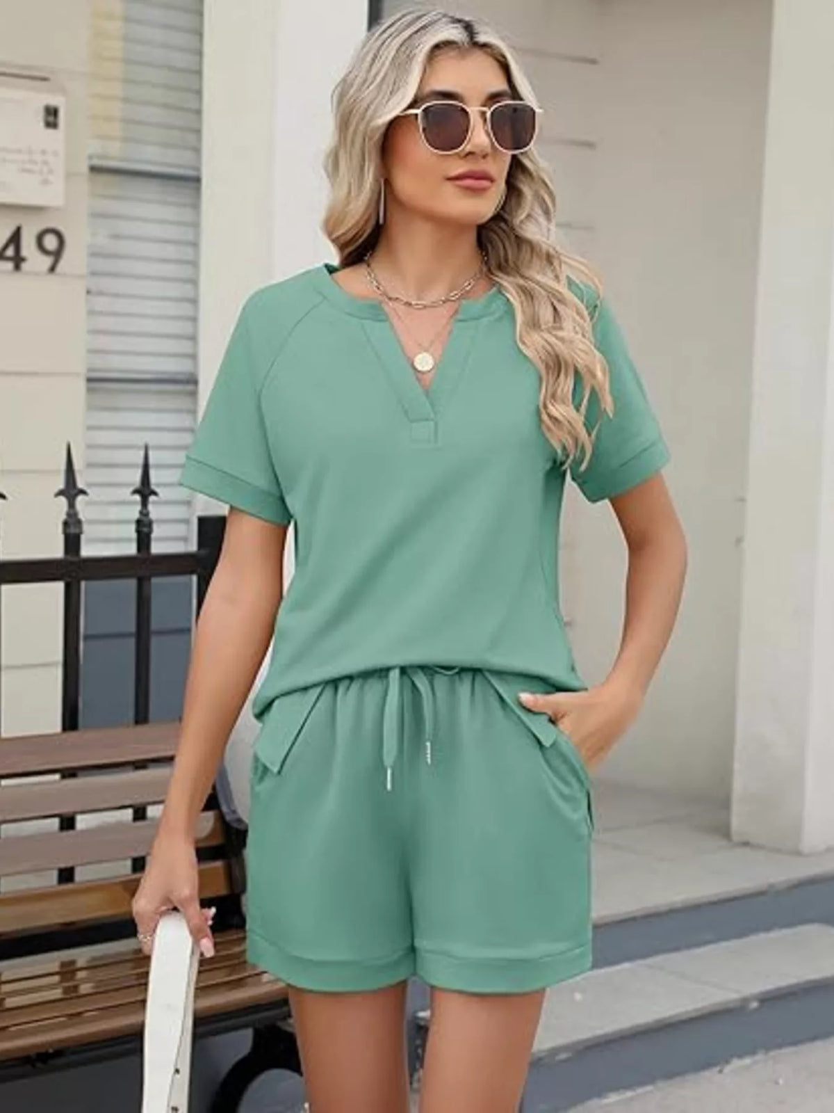 Plush Fashion Hub solid color short sleeve top and matching shorts two-piece apparel set for casual wear.