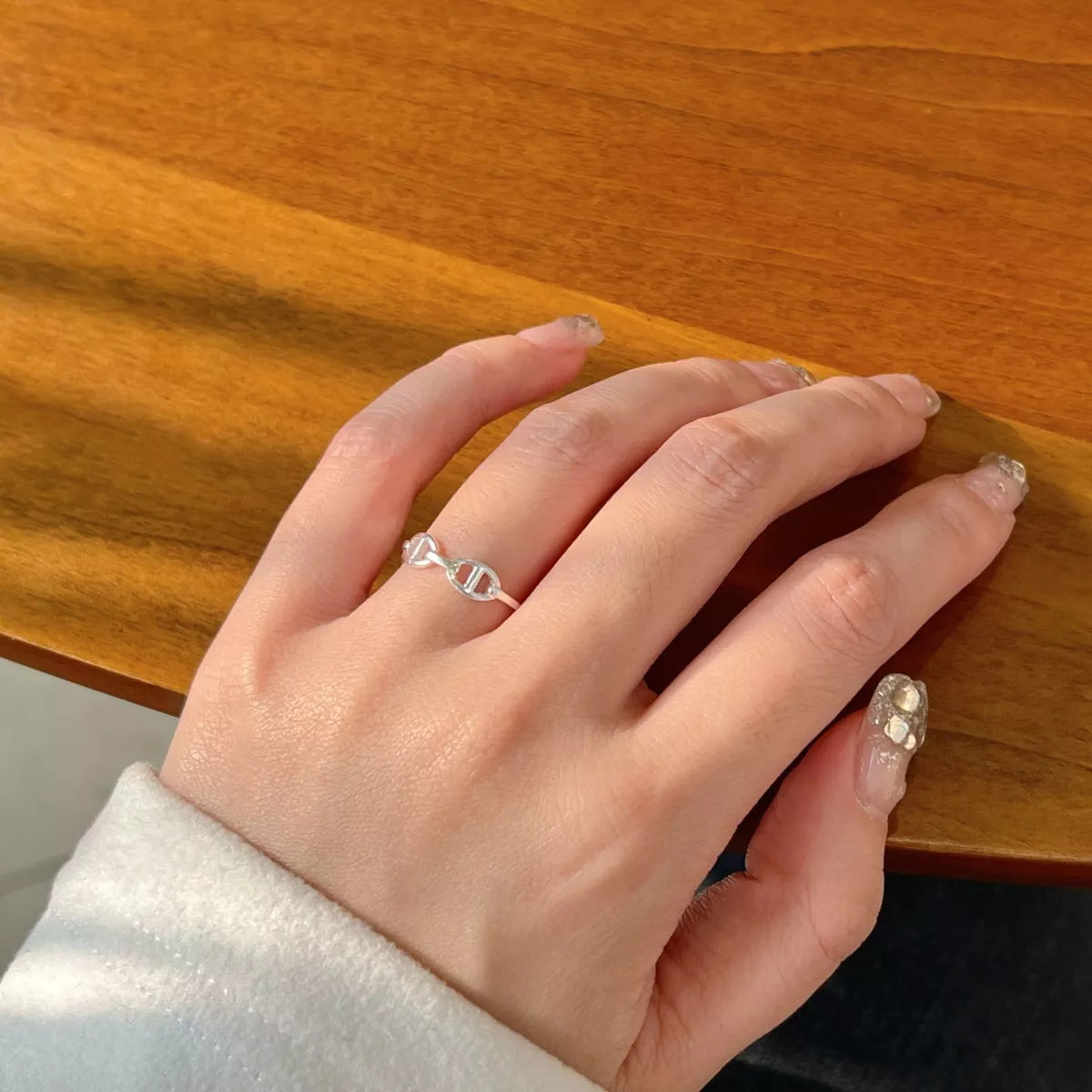 925 sterling silver geometric ring with modern design, showcasing clean lines and a polished finish, perfect for stylish jewelry.