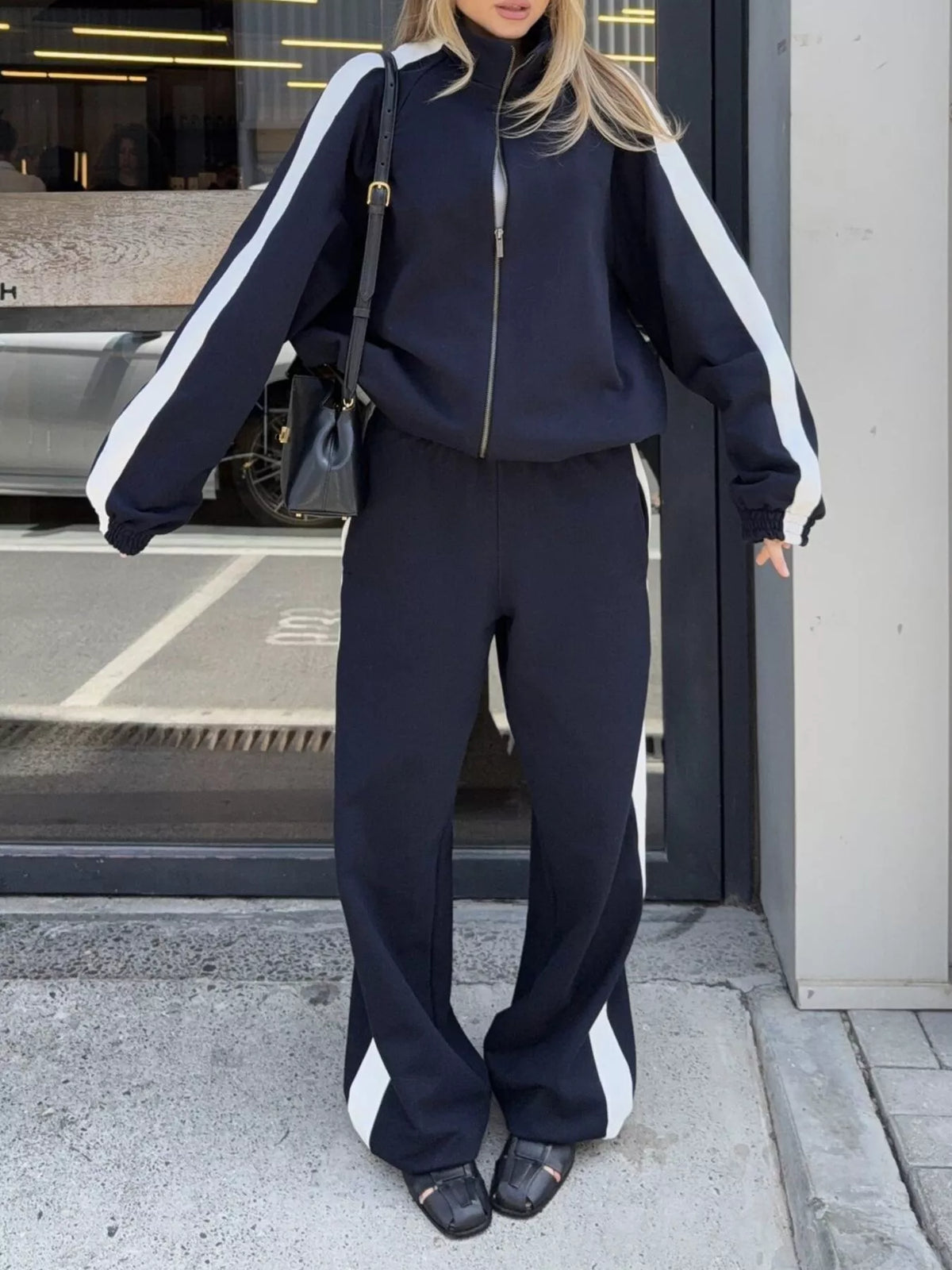 Plush Fashion Hub zip-up long sleeve tracksuit set in soft fabric, featuring a stylish design and comfortable fit.