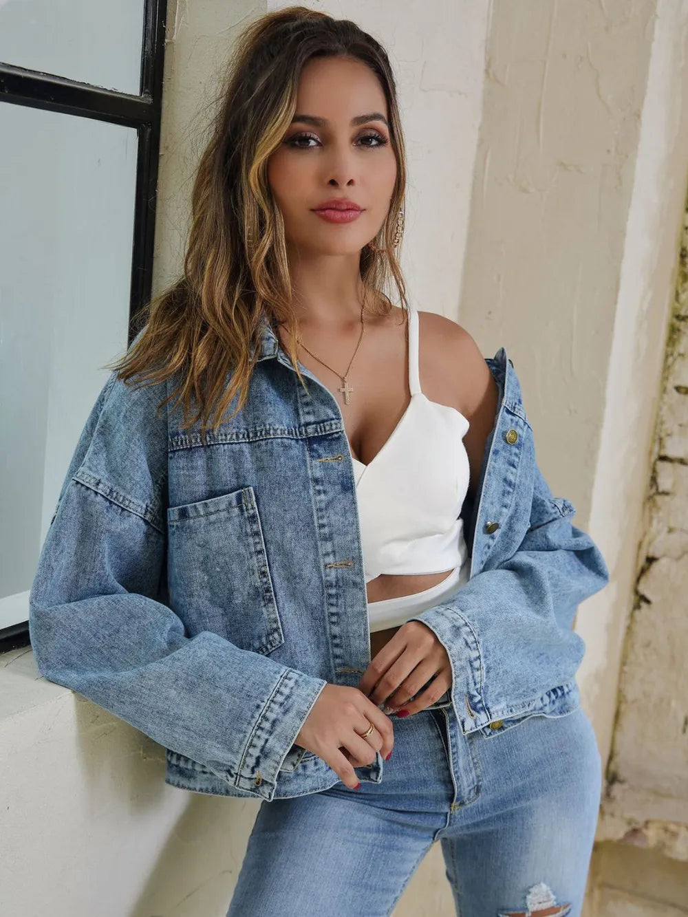 Trendsi denim jacket with drop shoulder design and button-down front, showcasing classic blue denim fabric and casual style.