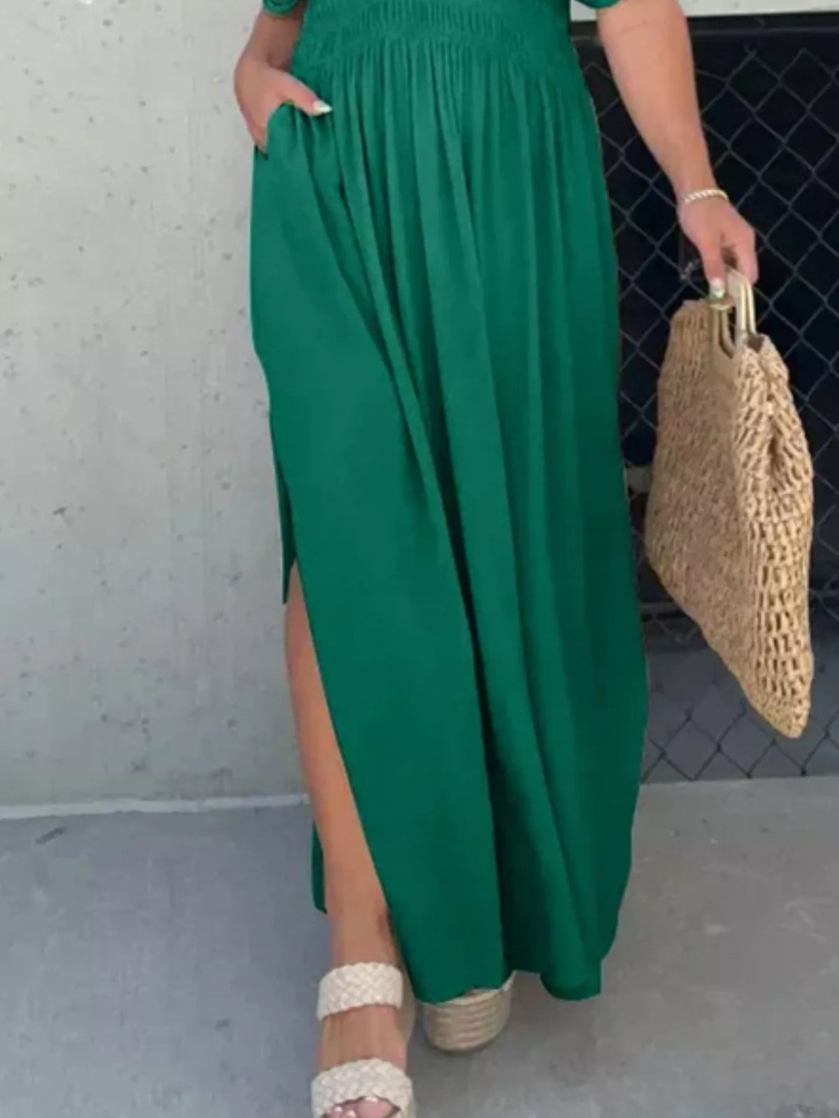 Plus size full slit V-neck smocked waist maxi dress by Plush Fashion Hub, showcasing flowy fabric and stylish design.