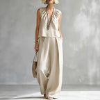 Women's sleeveless cotton-linen shirt and pants set by FitiqueFit, casual urban 2-piece outfit shown in natural fabric and relaxed fit.