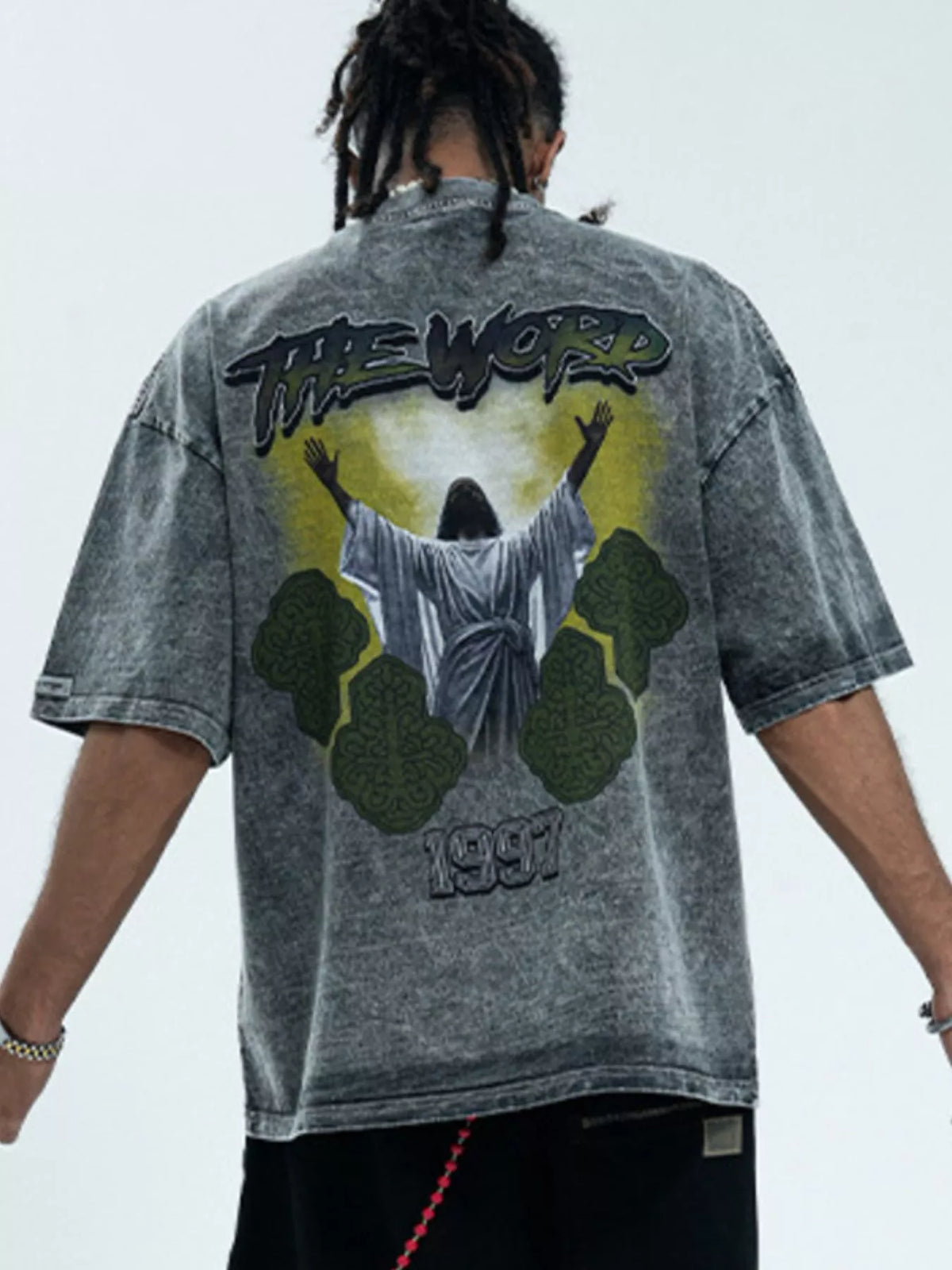 Men's graphic round neck short sleeve T-shirt from Trendsi featuring a stylish design on a casual men's T-shirt.