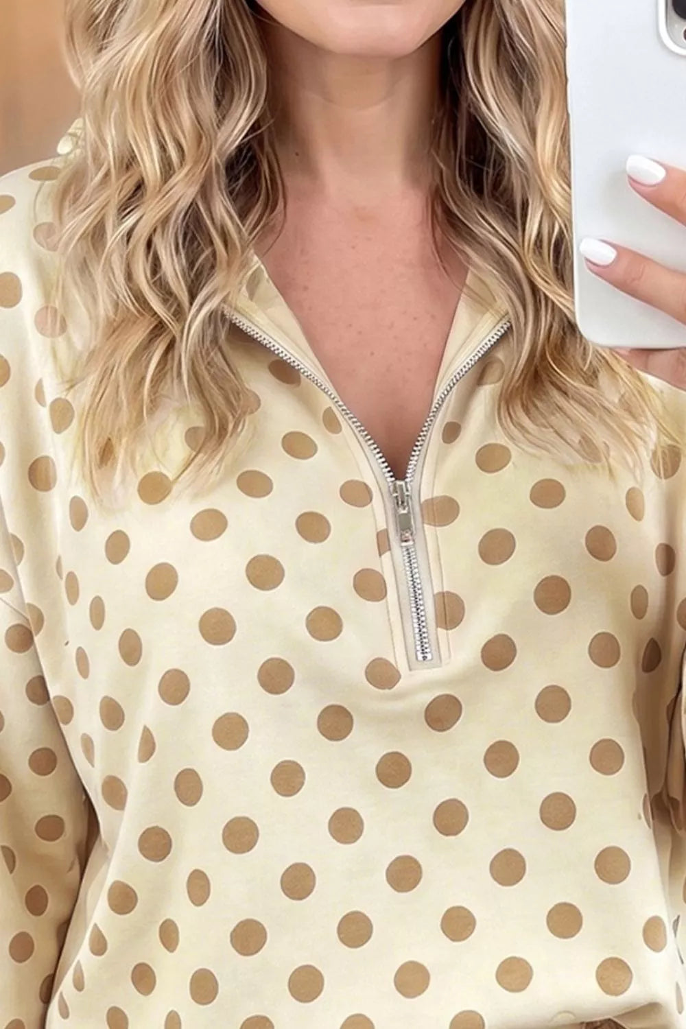 Polka dot quarter zip sweatshirt and shorts set for women by Trendsi, featuring a stylish, casual loungewear look.