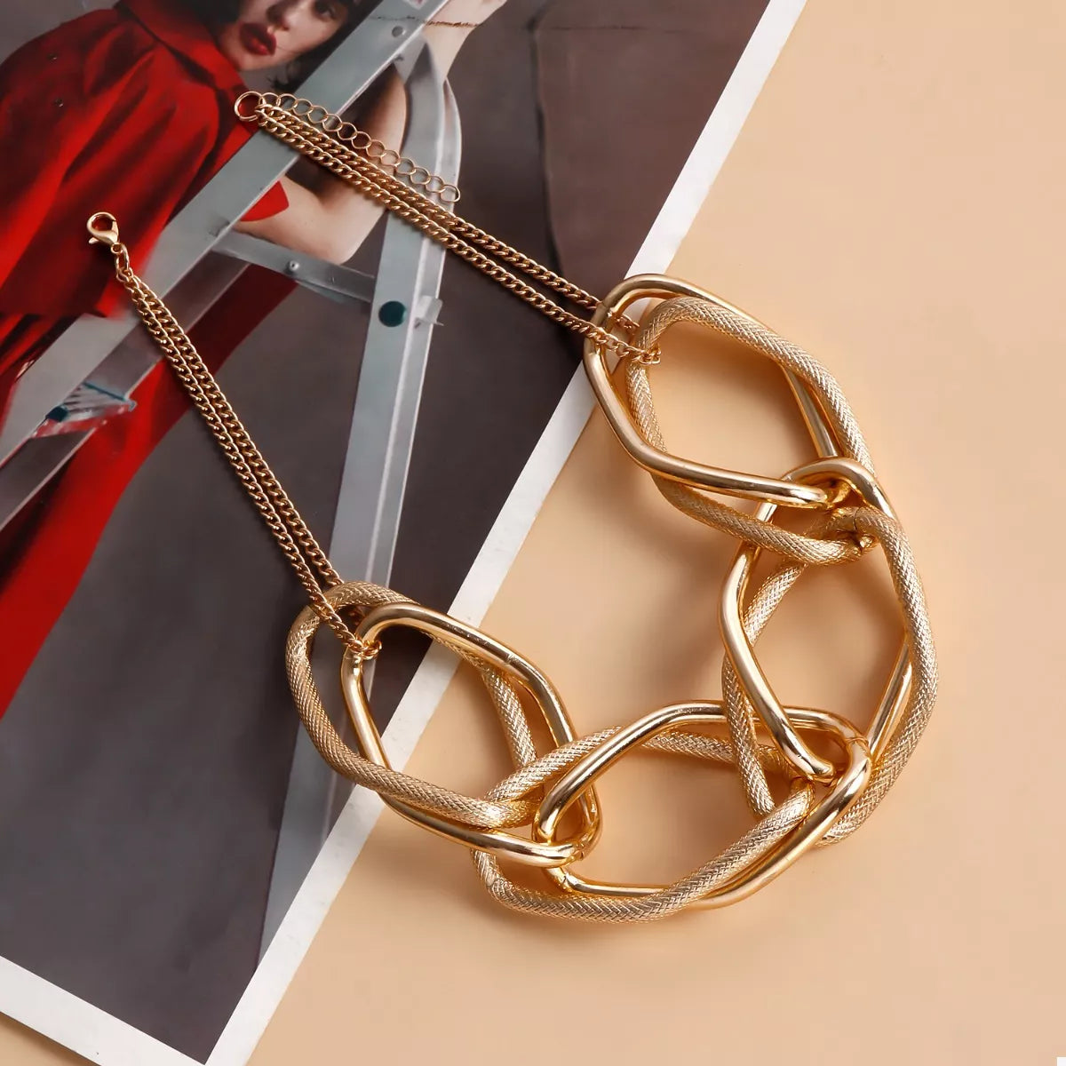 Gold-plated chain necklace from Plush Fashion Hub with a sleek, stylish design on a white background.