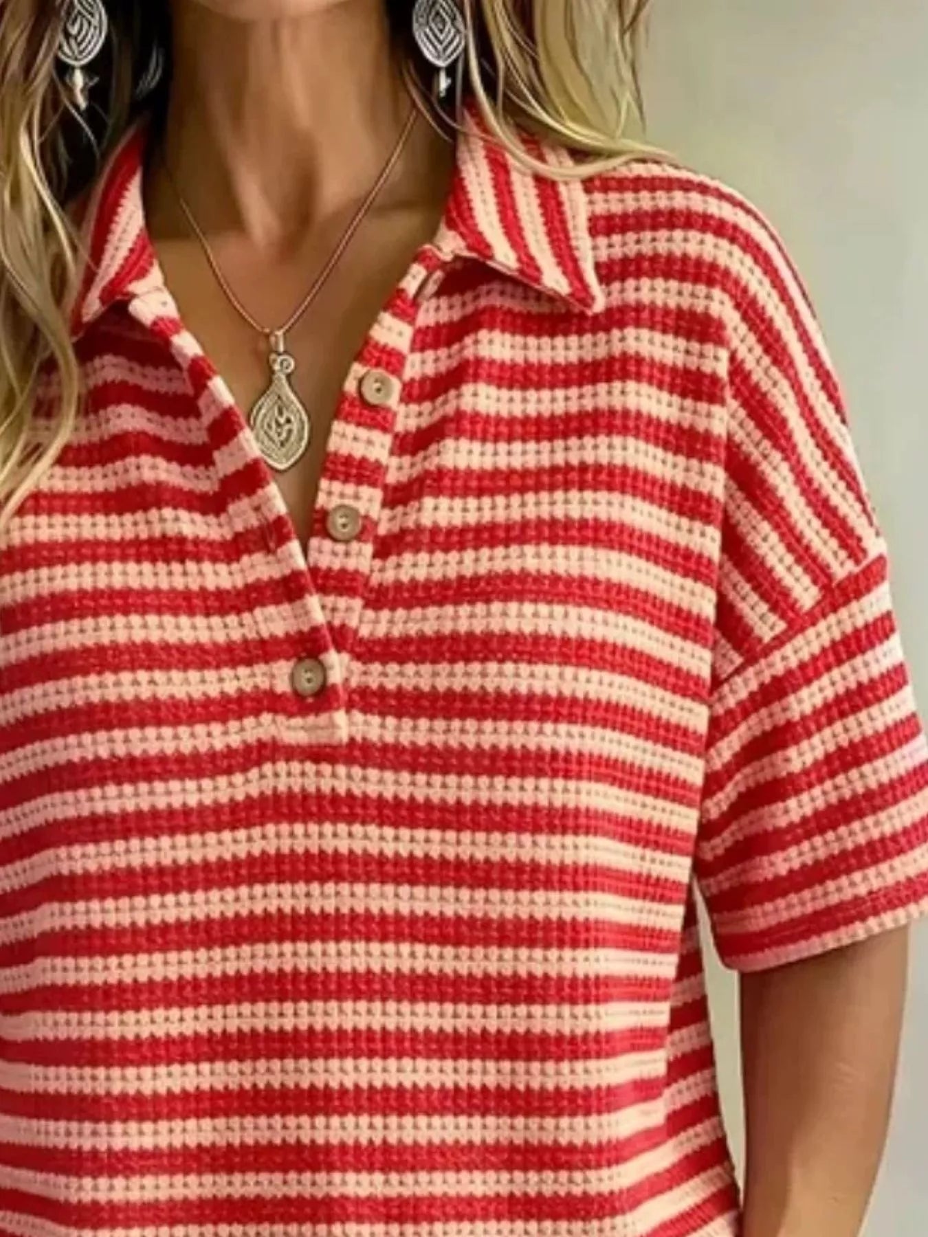 Plus size contrast striped knit polo shirt from Trendsi, showing a full-front view of the colorful, fitted tops.