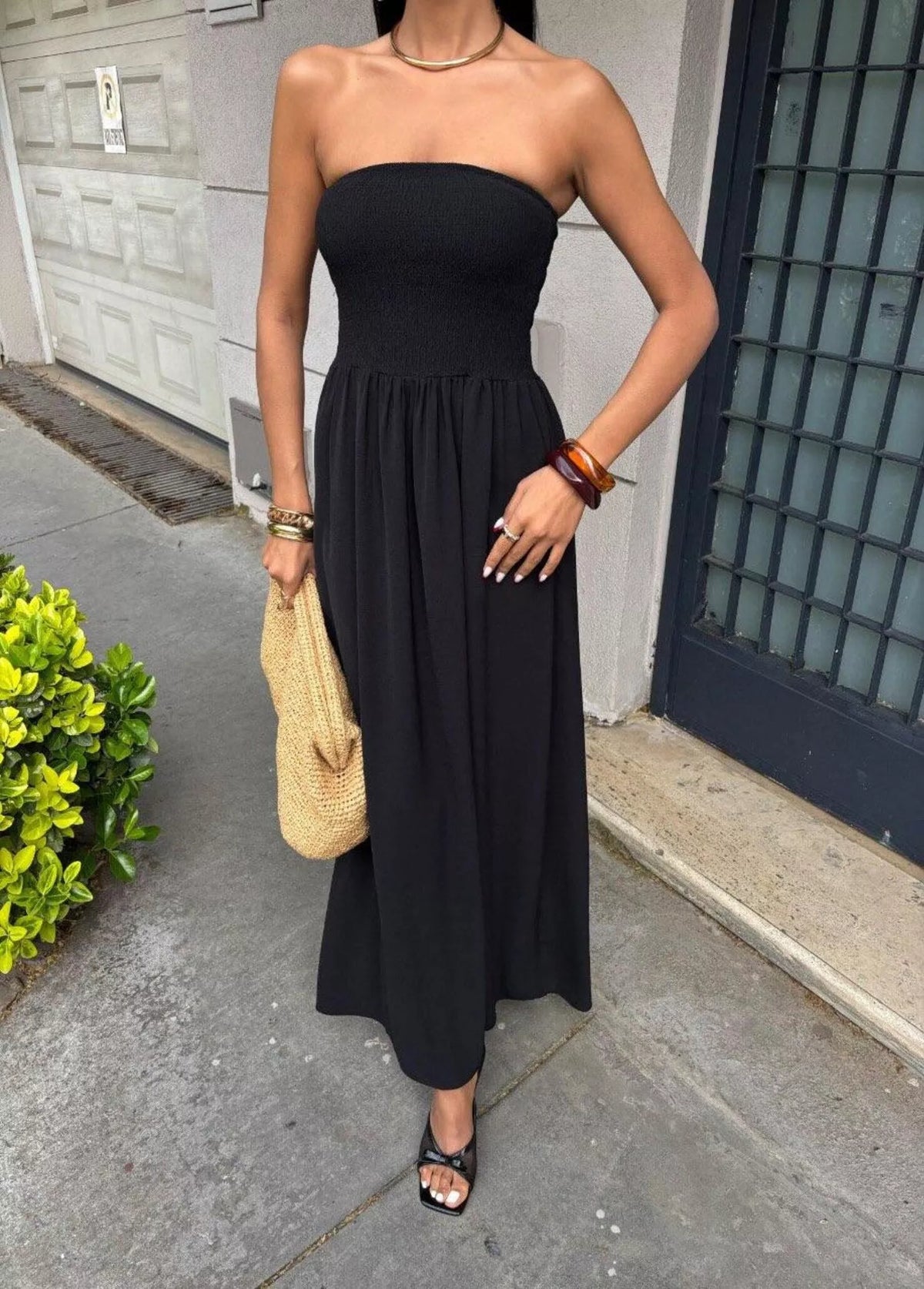 Stripless smocked maxi dress by Plush Fashion Hub featuring a fitted bodice, flowing skirt, and vibrant floral pattern.