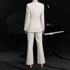 Women's elegant hollow-out long-sleeve suit jacket and pants set by FitiqueFit, featuring stylish cutouts and tailored fit.