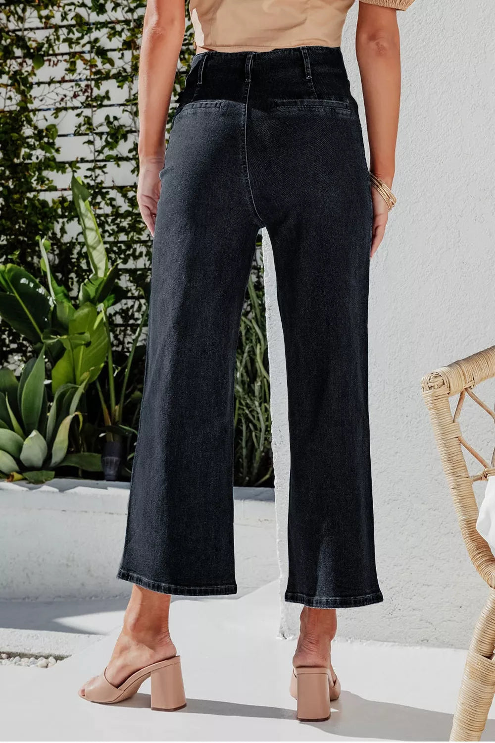 Plush Fashion Hub high-waisted wide-leg jeans with button-fly, plush fabric, and relaxed fit shown on a model.