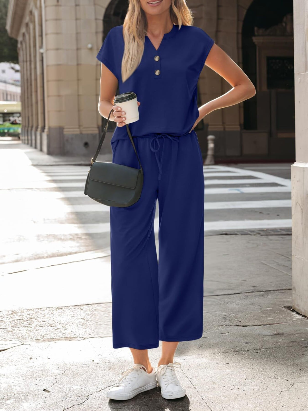 Women's plush fashion hub notched short sleeve lounge set with pockets, featuring a comfortable 2-piece design and relaxed fit.