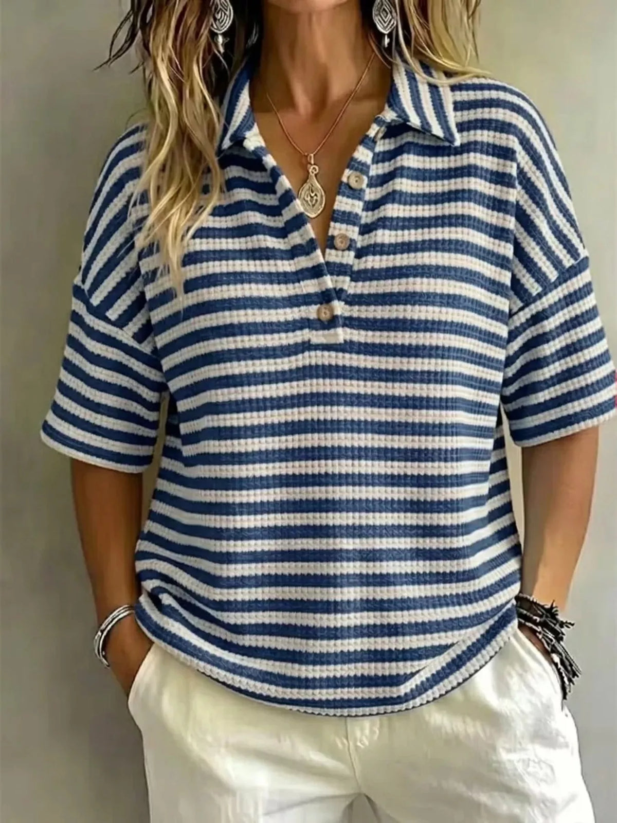 Plus size contrast striped knit polo shirt for women, featuring a classic collar and short sleeves, by Trendsi.