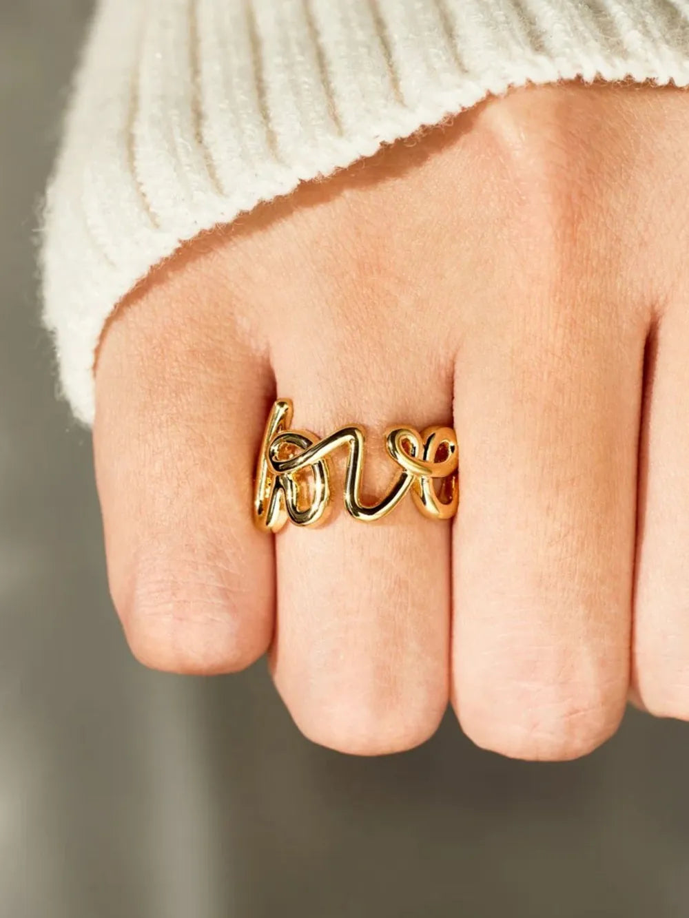 Sterling silver ring with 18K gold plating, featuring a sleek and polished design, perfect for stylish jewelry collection.