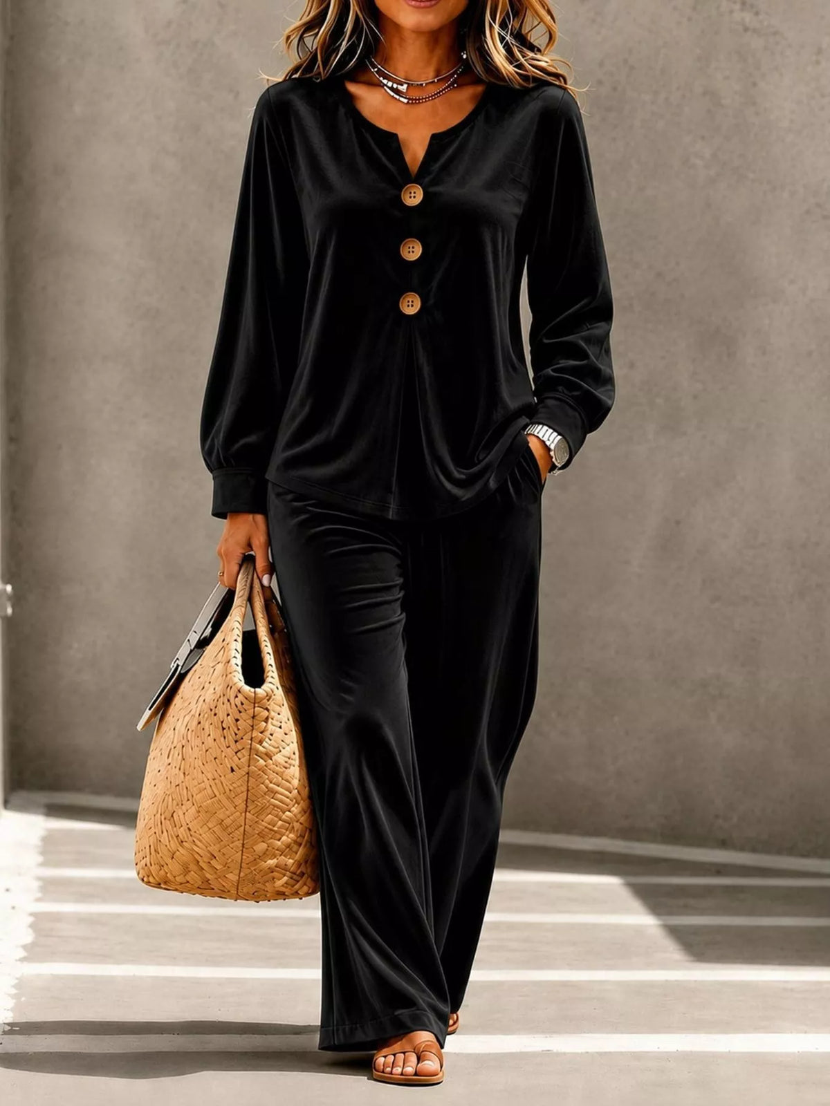 Elegant velvet button top and pants set by Trendsi featuring a stylish, coordinated fashion look with a soft, luxurious fabric.