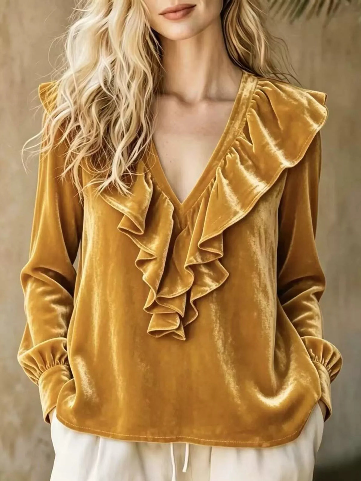 Plus size long sleeve V-neck ruffled blouse from Trendsi, featuring a stylish design and full-length sleeves.
