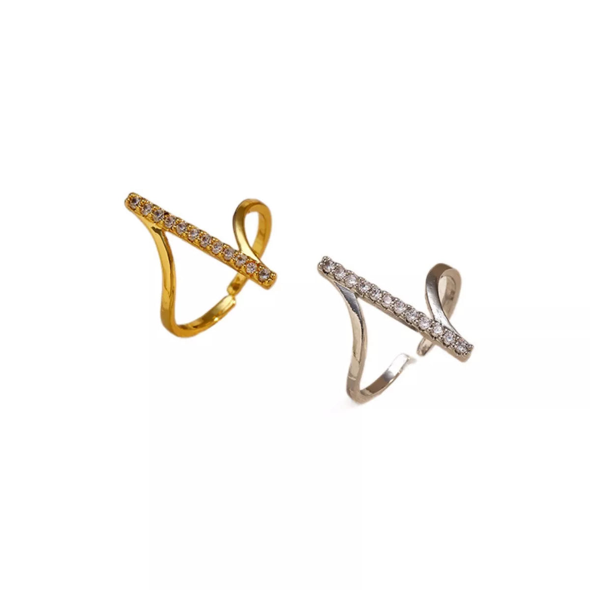 Irregular rhinestone ring with sparkling stones on a silver band, showcasing unique design and elegant style.