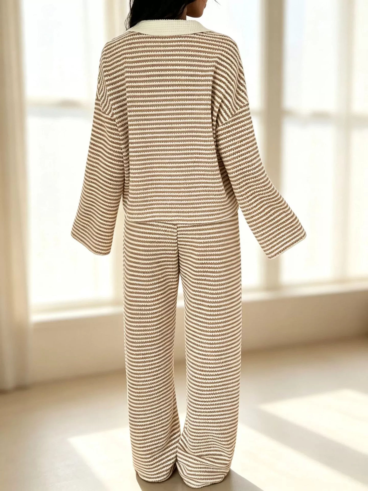 Striped long sleeve polo shirt and wide-leg pants set by Trendsi, featuring a casual, stylish outfit with bold stripe pattern.