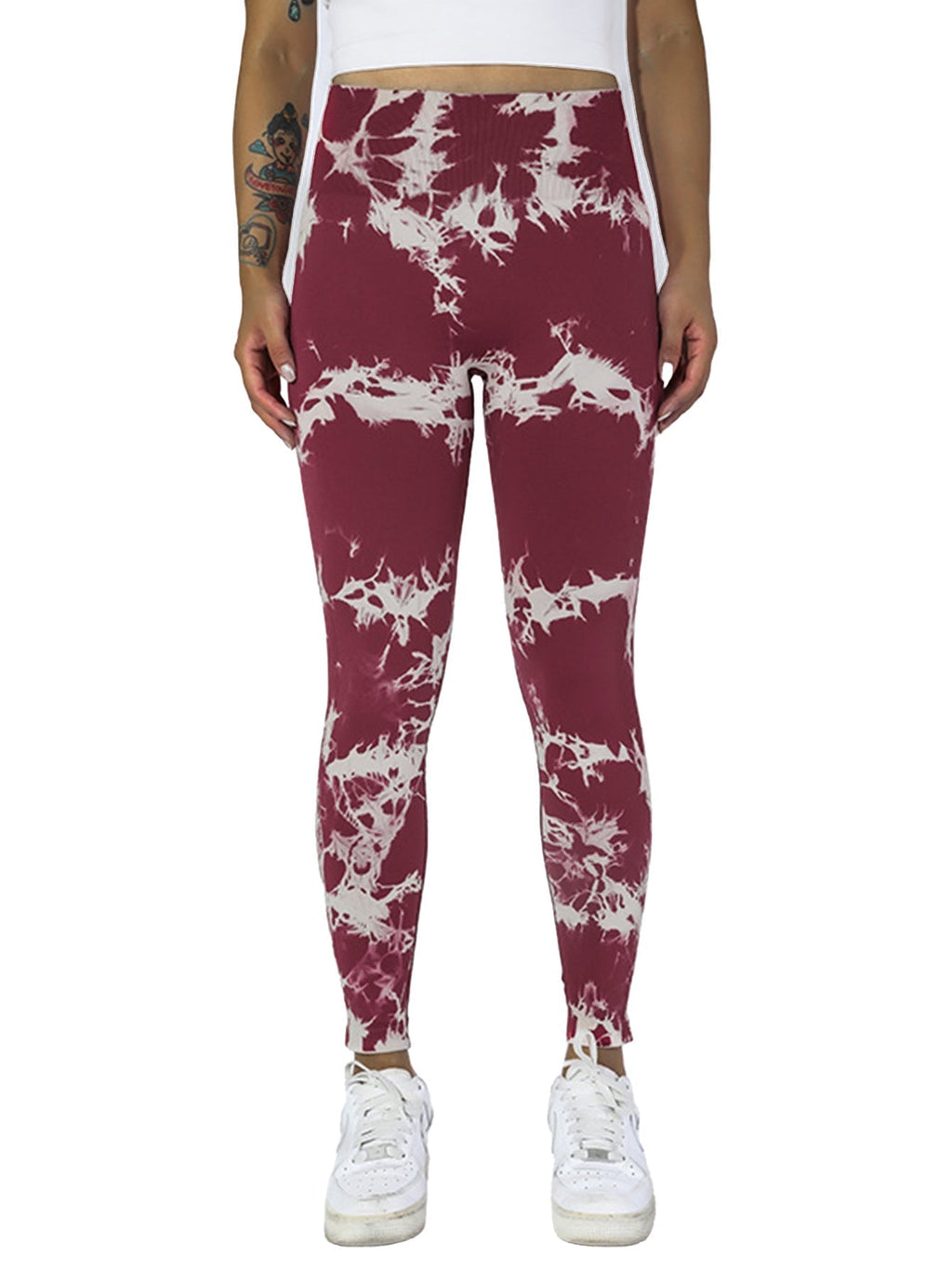 Five pairs of Tie Dye Cut-Out Leggings from FitiqueFit, colorful activewear with stylish cut-out details in each pair.