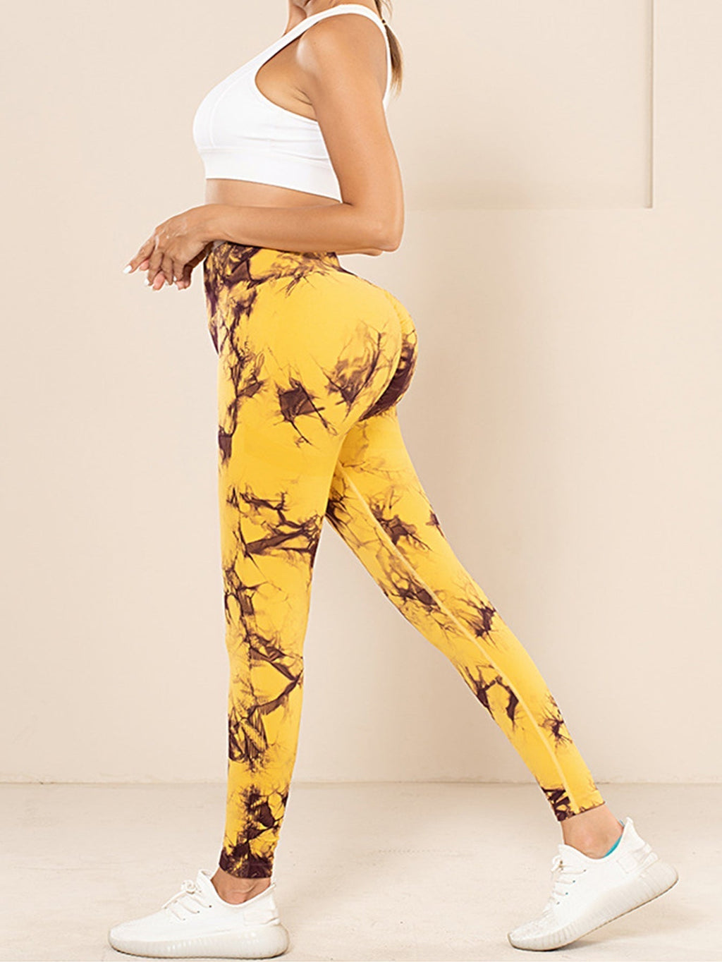 Five-pack of tie-dye activewear leggings with cut-out designs by FitiqueFit, featuring colorful patterns and comfortable stretch fabric.