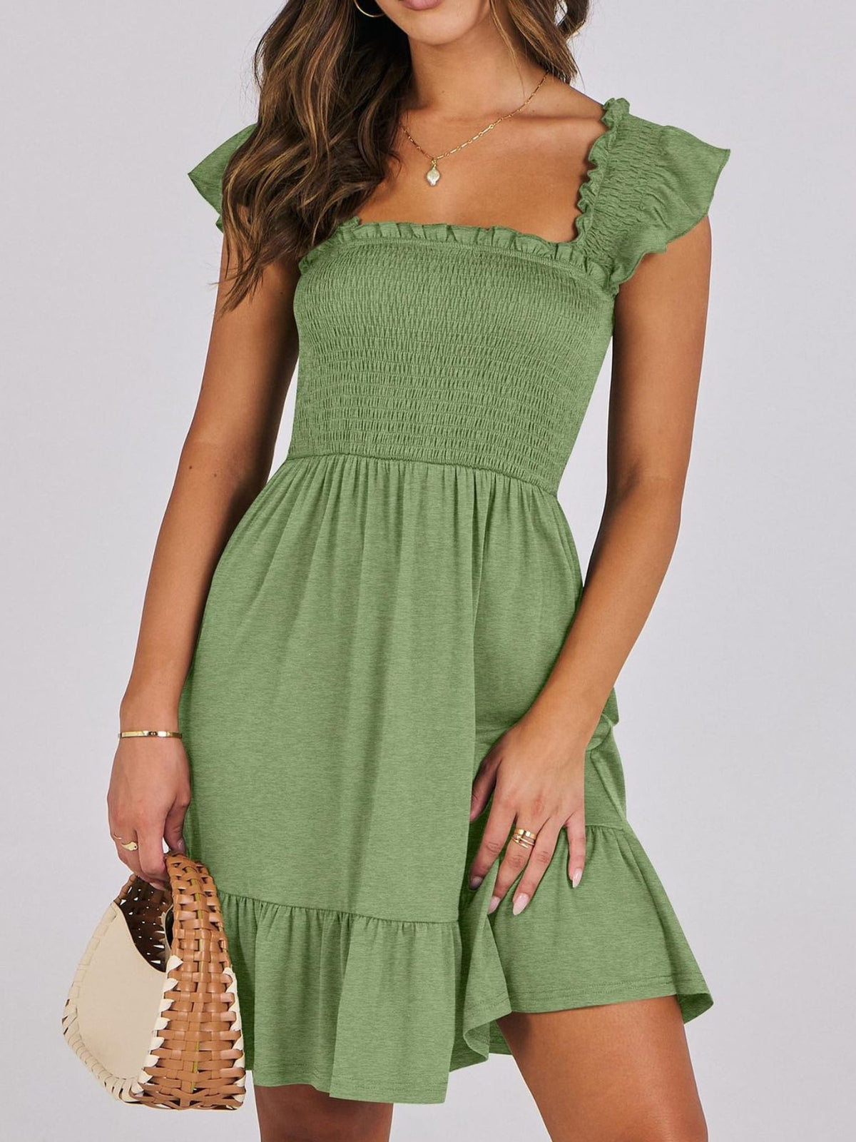 Women's lightweight summer dress by Plush Fashion Hub with smocked bodice, ruffle hem, mini length, casual style