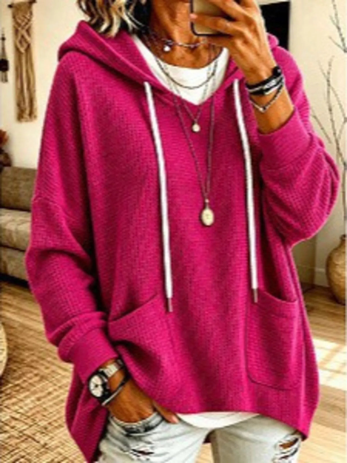Plus size women's waffle knit hoodie with pockets by Trendsi, featuring a cozy full-coverage design and casual style.