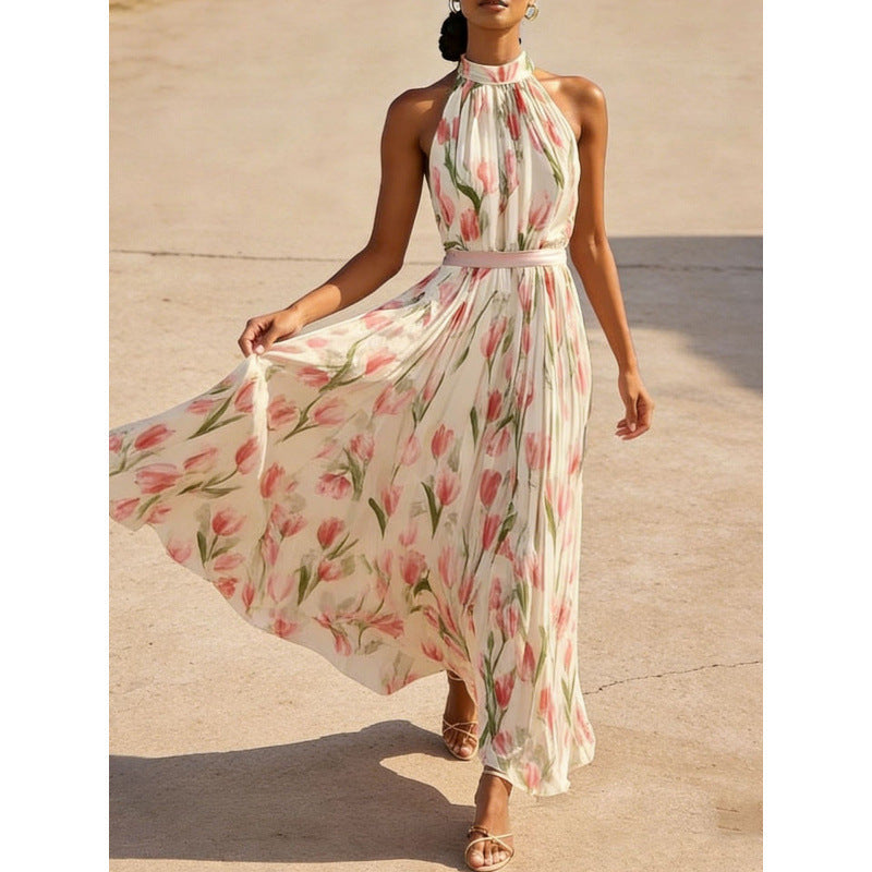 Women's halterneck high-waist swing dress by FitiqueFit featuring floral and solid print casualwear, flowing fabric and sleeveless design.
