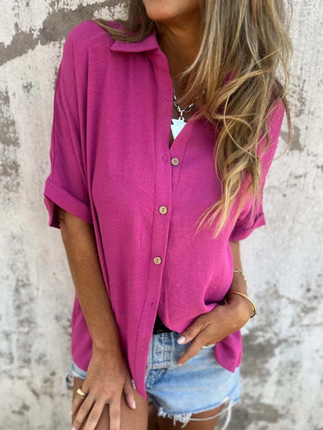 Women's short-sleeve collared button-down blouse from Plush Fashion Hub, stylish office top with a classic design.